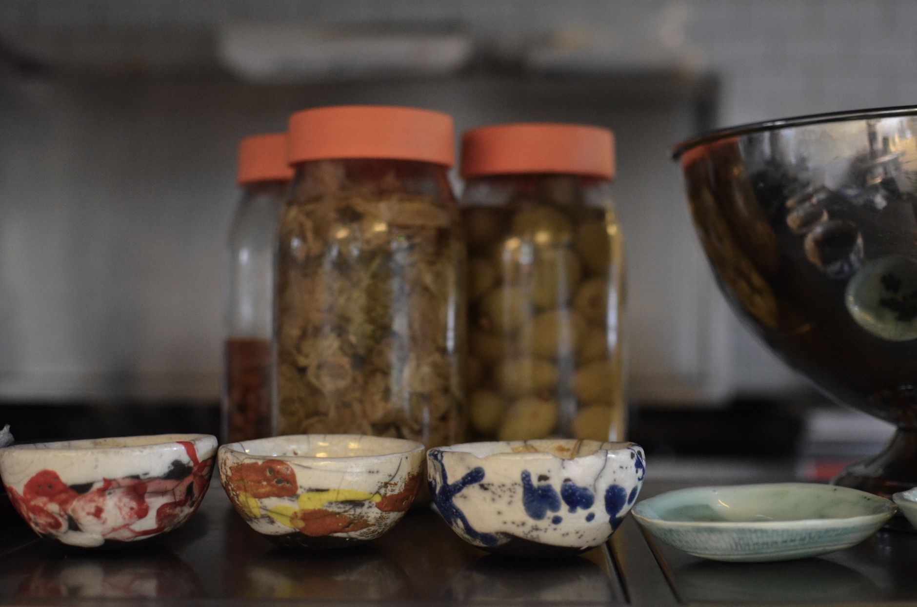 Traditional Japanese ceramic fermentation jars and wood cedar utensils